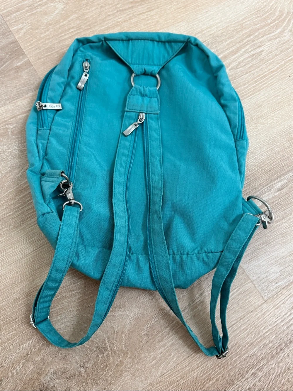 Baggallini Excursion Sling Rare Teal Color Convertible Crossbody to Backpack